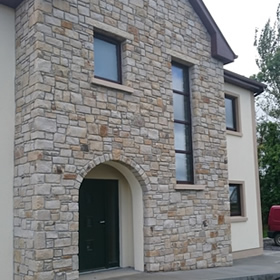 Building sandstone for gable end house facade